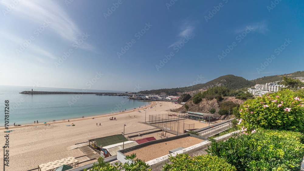 Panorama showing the coastline of the village of Sesimbra timelapse. Portugal