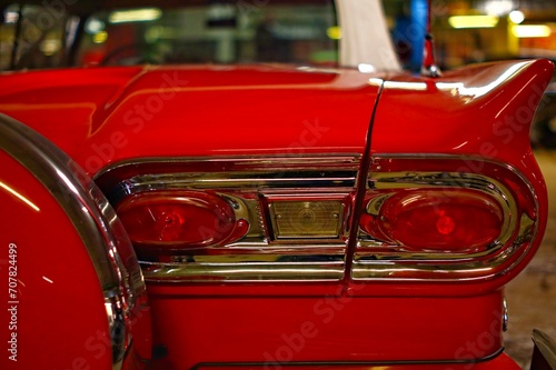 Taillights of an old vintage car in red color