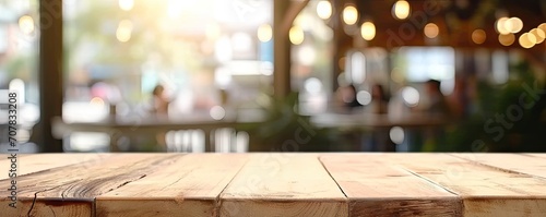 Rustic elegance. Abstract composition featuring wooden table and counter blurred background with bokeh lights perfect for showcasing products or creating warm vintage atmosphere in restaurant or cafe