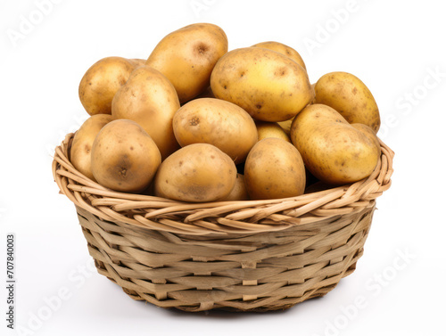 pile of potatoes in basket isolated on white background