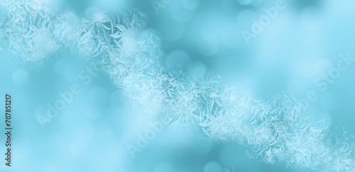 Snow pattern. Light blue shiny winter blurred background. Template for graphic designers	