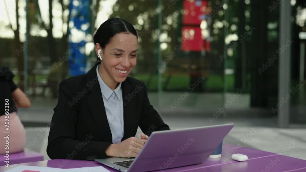 Joyful Entrepreneur Engages in Online Video Call, Waving Greetings Through the Laptop. Positive Educator Conducts Online Lecture, Connecting with Students Virtually. People and Technology Concept Joyful Entrepreneur Engages in Online Video Call, Waving Greetings Through the Laptop. Positive Educator Conducts Online Lecture, Connecting with Students Virtually. People and Technology Concept