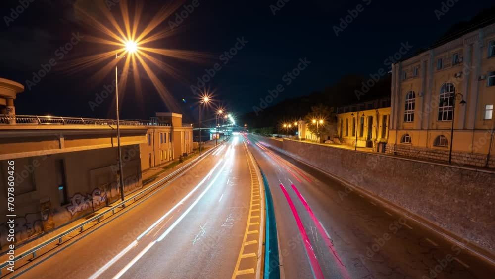 A vivid time-lapse of a fast night drive through a big city at night. A vivid time-lapse of a fast night drive through a big city at night.