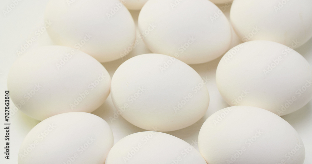 Many white chicken eggs. Food and food preparation concept. Many white chicken eggs. Food and food preparation concept.