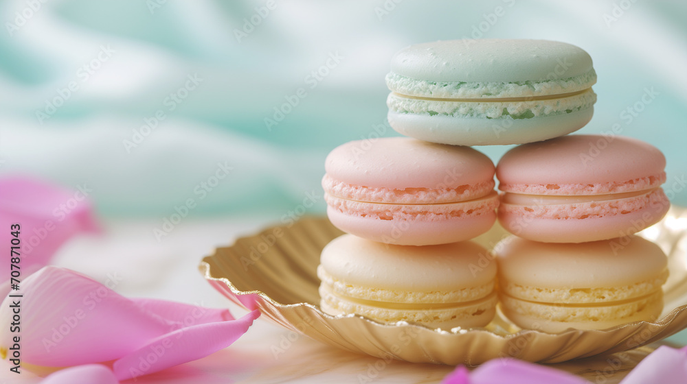 French Macaroon on a Gold Shell Plate. Wedding Menu and Decoration. Bridal social media banner with copy space. Pale Blue Background. Glamorous cake shop advert. French Macaroon on a Gold Shell Plate. Wedding Menu and Decoration. Bridal social media banner with copy space. Pale Blue Background. Glamorous cake shop advert.