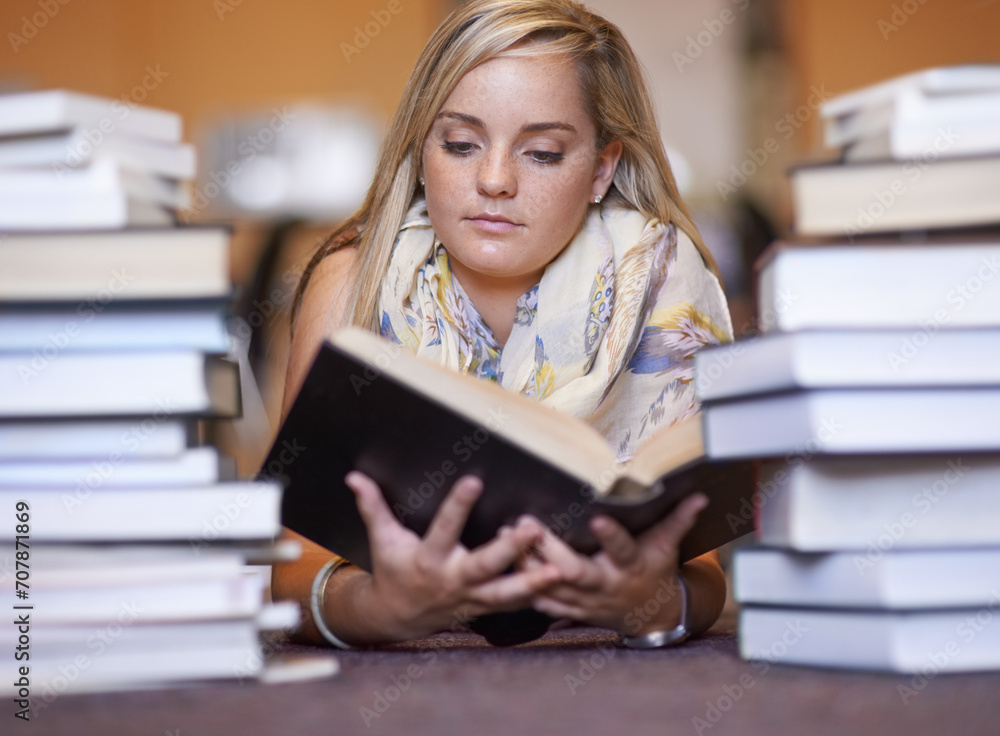 Woman, library and reading book on floor for literature, learning or knowledge at bookstore. Young female person, bookworm or student looking at information for story, research or study of author Woman, library and reading book on floor for literature, learning or knowledge at bookstore. Young female person, bookworm or student looking at information for story, research or study of author
