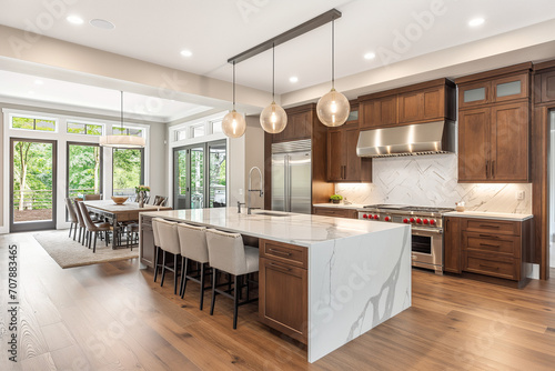 Modern designer kitchen with various furniture and appliances. Rent of modern housing, sale of a new apartment, modern renovation. Empty room.Interior of stylish modern kitchen. copy space