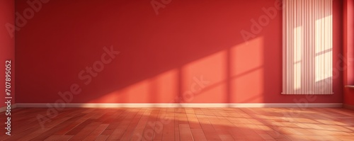 Light crimson wall and wooden parquet floor  sunrays and shadows from window