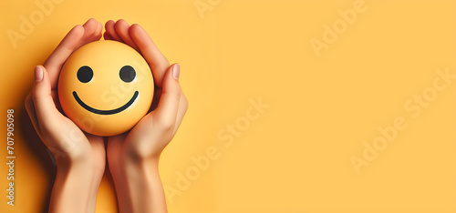 Hands holding happy smile face. mental health positive thinking and growth mindset concept.. on yellow backgroundcopy space. ai  generative photo