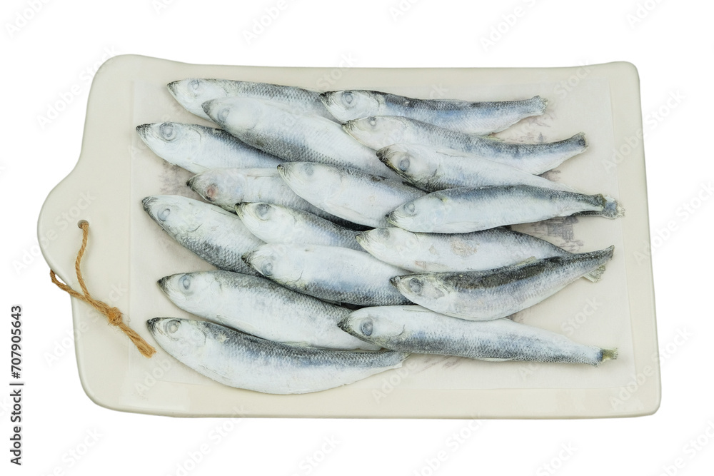 Raw smelt on white background. Iced Fish. Ready to cooking. Frozen fish. Raw smelt on white background. Iced Fish. Ready to cooking. Frozen fish.
