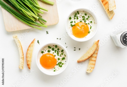 Eggs en cocotte (baked eggs) photo