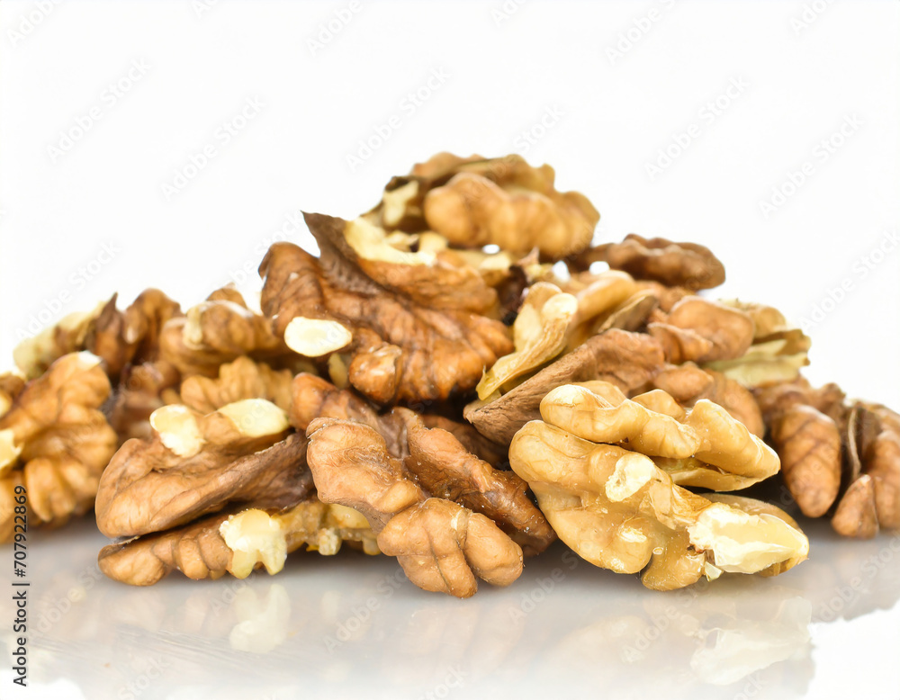 Pile of walnuts on a white background Pile of walnuts on a white background