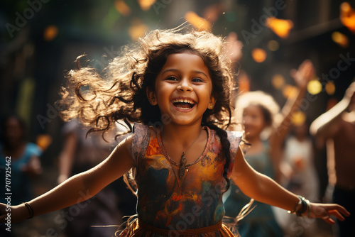 A joyful moment of an Indian little girl dancing © Sonu