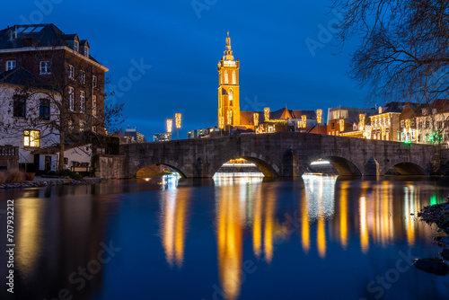 City of Roermond, Province Limburg, The Netherlands, view of St. Christopher's cathedral and river Roer in the evening