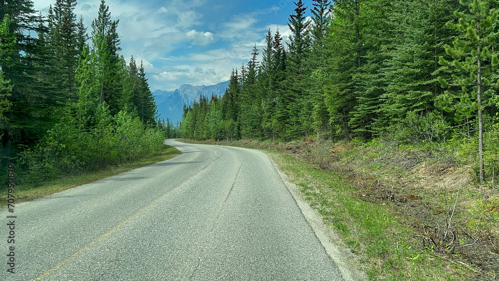 Driving along Miette Hot Springs Road in Jasper National Park near Jasper, AB Canada.