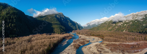 Fototapeta Naklejka Na Ścianę i Meble -  River flow in the Valley. Canadian Nature Landscape. Aerial