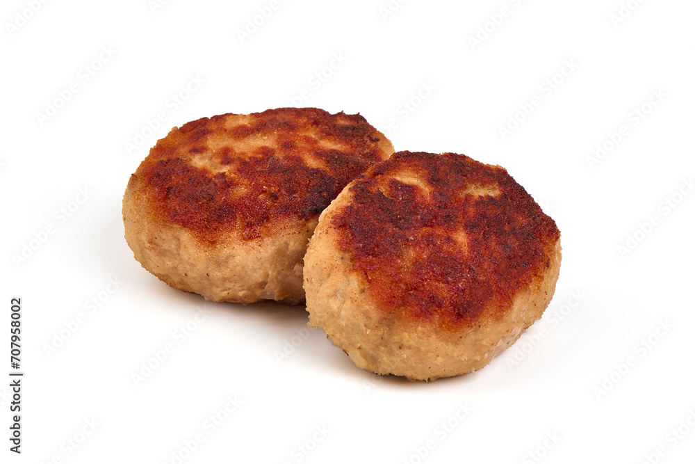 Roasted meatballs in breadcrumbs, close-up, isolated on a white background.