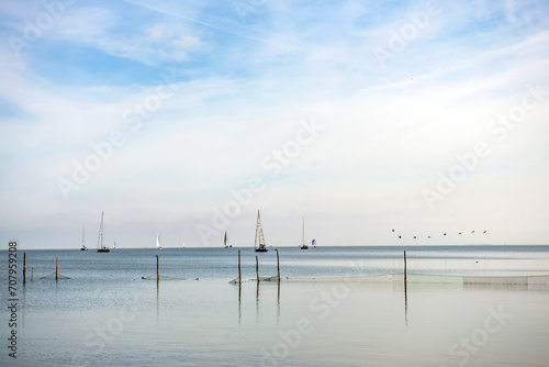 Sailing yachts and fishing boats moored in marina.Netherlands © manowar1973