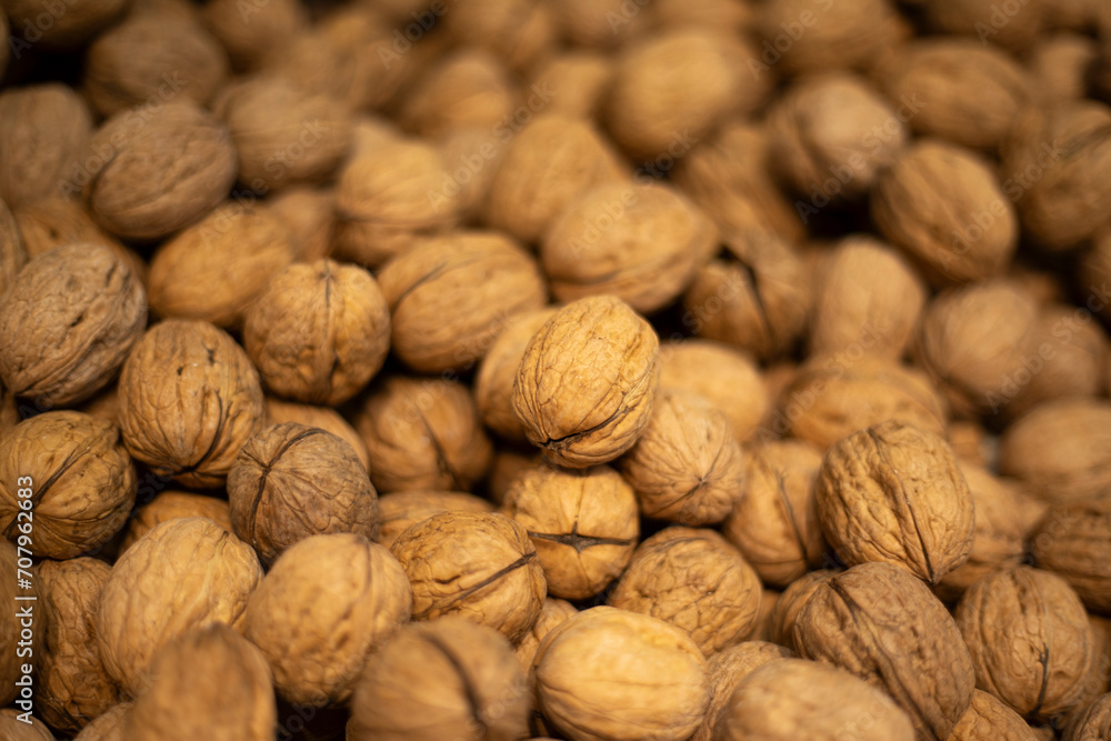 Walnuts on the market. Vegetable protein. Walnut in shell. Walnuts on the market. Vegetable protein. Walnut in shell.