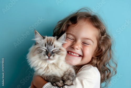 Innocent Grin: Child and Cat Delight