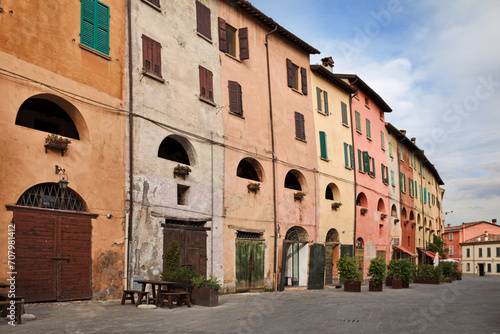 Brisighella, Emilia Romagna, Ravenna, Italy: old palace with colorful wall in the historic center of the ancient Italian town