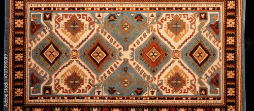 Traditional Jordanian wool carpet with geometric pattern, Jordan, Middle East - Textured carpet from Jordan with geometric design. photo