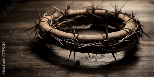 The crown of thorns of Jesus on wooden background