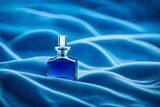 perfume spray bottle template , blue pigment powder and colored sand background