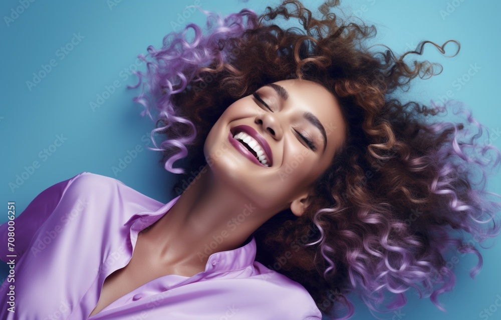 Ecstatic woman with purple curly hair