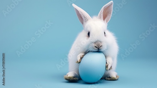 Cute bunny and single easter egg. Concept and idea of happy easter day. © Gustav