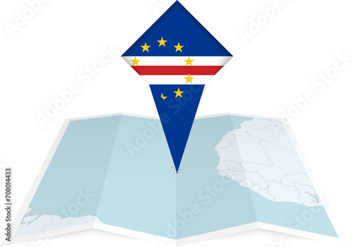Cape Verde pin flag and map on a folded map photo