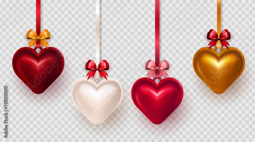 Set of 4 realistic three dimensional red, golden, pink and white puffy heart hanging on ribbons with bow. 3d glossy heart pendant as decoration element for Valentines Day photo