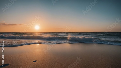 sunset over the sea a beach with waves and the sun setting