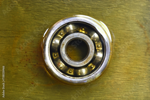 ball bearing in lubricant oil . old ball bearing in motor oil