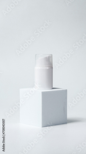 Luxury cosmetics on a white podium, mock up