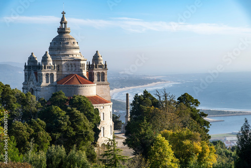 Viana do Castelo, Portugal-October 7, 2023; Sanctuary of the Sacred Heart of Jesus or Sanctuary of Santa Luzia located at the top of Mount Santa Luzia with area beaches in background photo