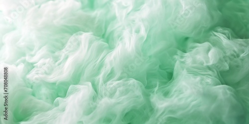 Mint green fluffy cotton candy background, soft pastel fresh color sweet candyfloss, abstract blurred dessert texture background.
