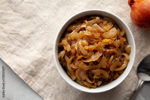 Organic Caramelized Onions in a Bowl, top view. Flat lay, overhead, from above. Copy space.