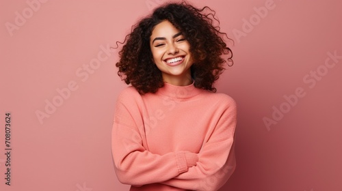 Young mexican woman wearing casual clothes hugging oneself happy and positive