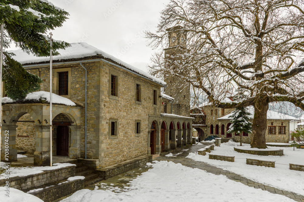 The picturesque village of Metsovo  during winter season covered with snow  with its architectural traditional old stone  buildings located east Zagori, Epirus, Greece, Europe