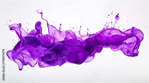 Purple ink falls into the water. photo