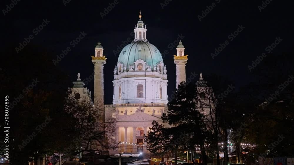 Night view of St. Charles Church (Karlskirche) in Vienna, Austria with parallax movement Night view of St. Charles Church (Karlskirche) in Vienna, Austria with parallax movement