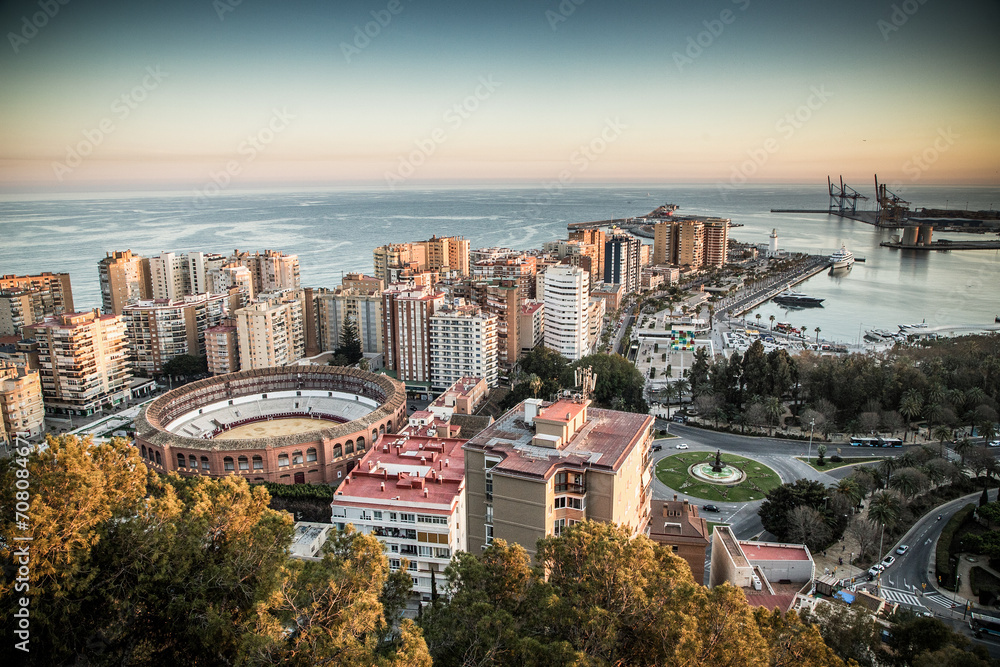 Fototapeta premium view over Malaga at sunset travel banner