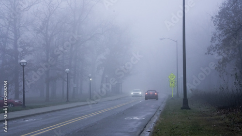 Fényképezés foggy street in the middle of the city on an overcast day