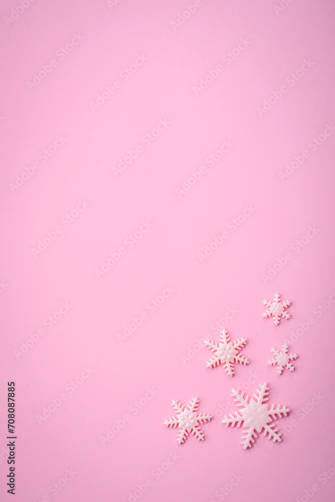 Beautiful winter snowflakes on a plain background with copy space