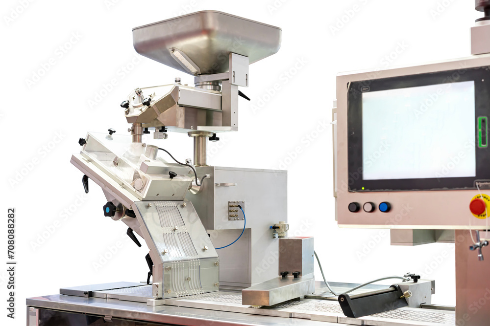 material loading unit or tablets feeding system and other component of automatic continuous blister packing machine in pharmaceutical industrial isolated on white with clipping path