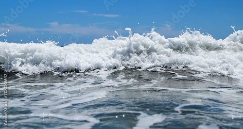Blue sea wiht wave and blue sky background. Summer sea and blue sky. © Bookaroo68