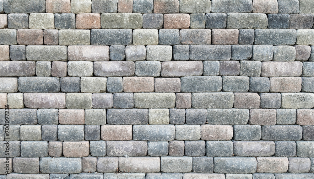 Wide angle view of a stacked stone wall. Wide angle view of a stacked stone wall.