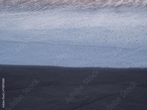 beach with black volcanic sand on  Tenerife