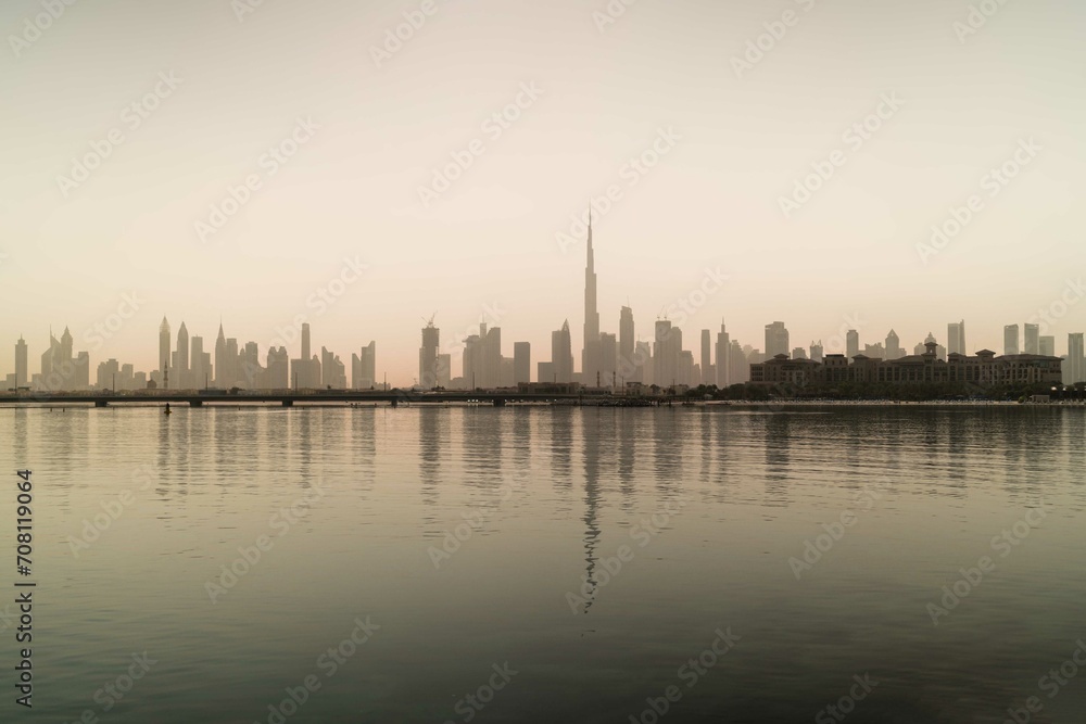 Skyline of Dubai reflecting in the water